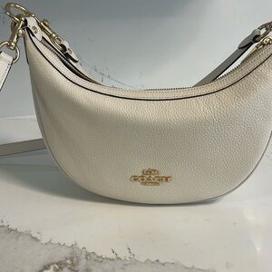 Coach co996 pebble leather crossbody bag, with smaller strap option.